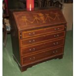 An Edwardian inlaid mahogany bureau.