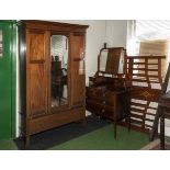 An Edwardian inlaid mahogany bedroom suite