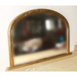 A gilt framed mirror.