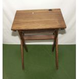 A vintage folding school desk