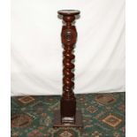 A mahogany pedestal