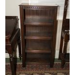 An oak open front bookcase