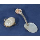 A vintage mother of pearl spoon and pill box