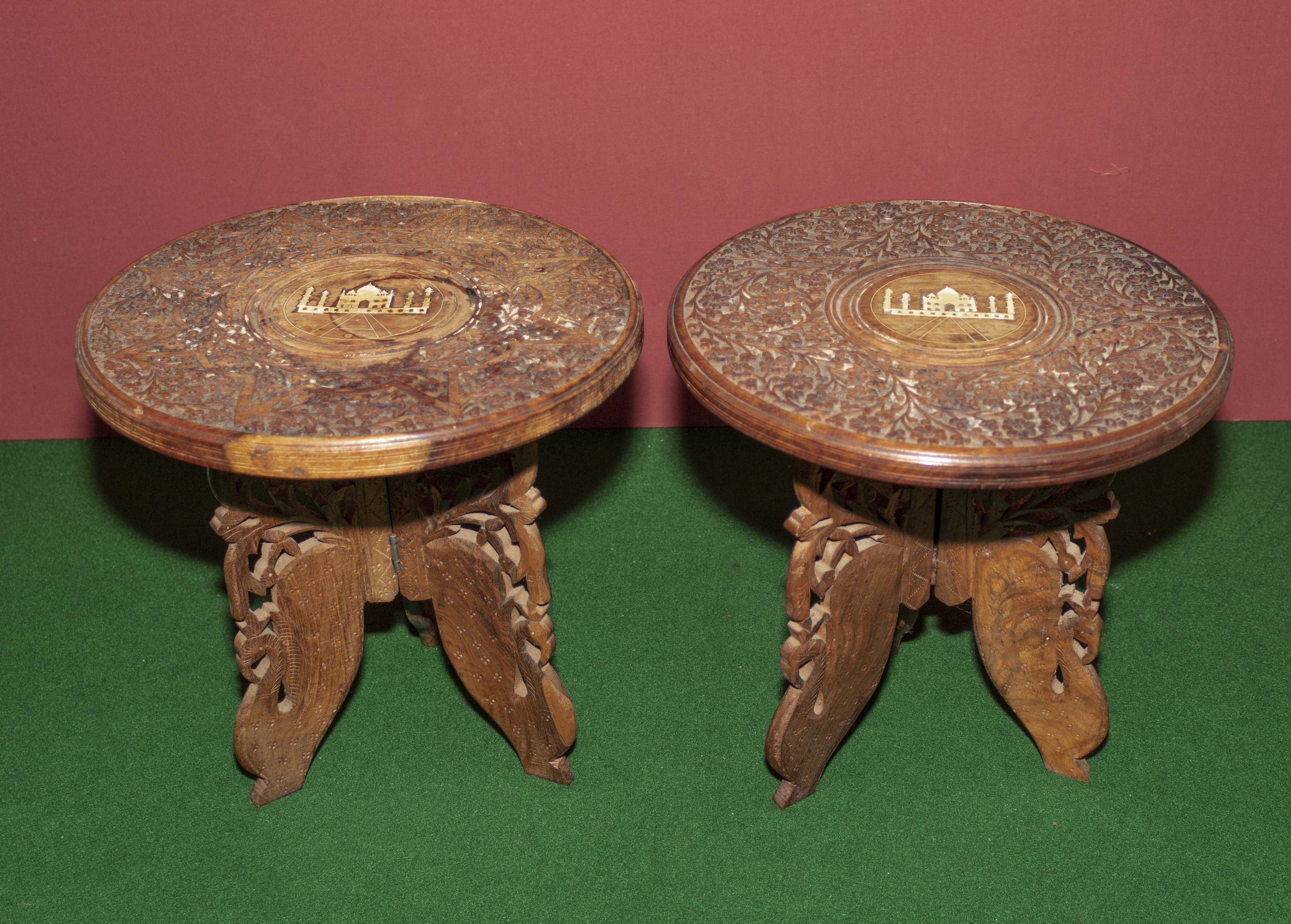 Two small carved Indian tables with ivory inlays.