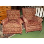 A pair of late Victorian easy chairs