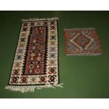 A Turkish Kilim rug and a Chobi Kilim 116 cm x 61 cm and 49 x 49