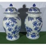A pair of 20th century Chinese blue and white glazed temple jars, 62cm tall