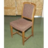 An upholstered dining chair