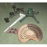 A vintage tractor seat, Christmas tree holder, weights and a candle stand