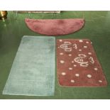 Two hearth rugs and a bath mat