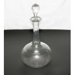 An etched glass decanter