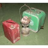 Two petrol cans and a tilly lamp