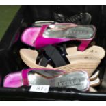 A box of lady's shoes, size 4