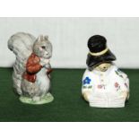 A Beswick 'Timmy Tiptoe' and Coalport 'Paddington Reading a Book'