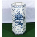 A 20th century Chinese hexagon shaped vase with blue dragon design, 32cm tall