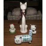 Four pottery cats