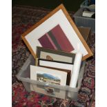 A box containing framed prints