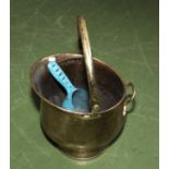 A brass coal bucket