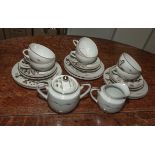 A Kutani egg shell China part tea service