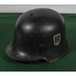 A WWII double decal German medics helmet
