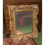 A gilt framed mirror