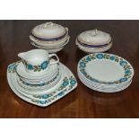 A part vintage dinner service and three tureens