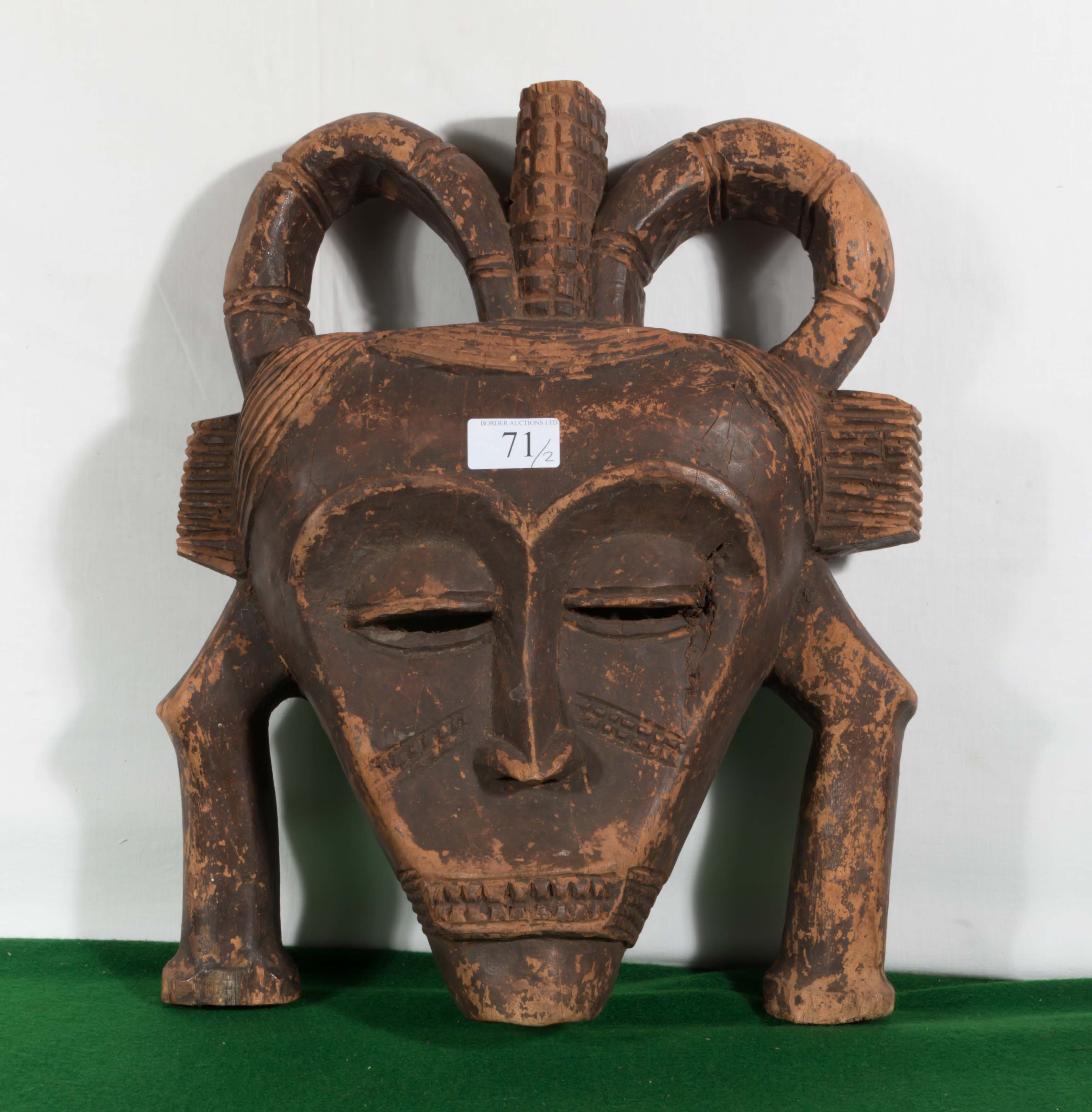 A carved African wooden mask together with a three necked bottle - Image 2 of 8