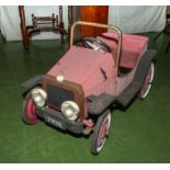 A childâ€™s vintage model car