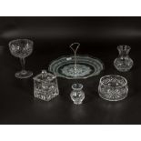 Five pieces of crystal and a cake plate
