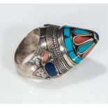 An Afghan ceremonial ring inlaid with turquoise, lapiz lazuli and coral