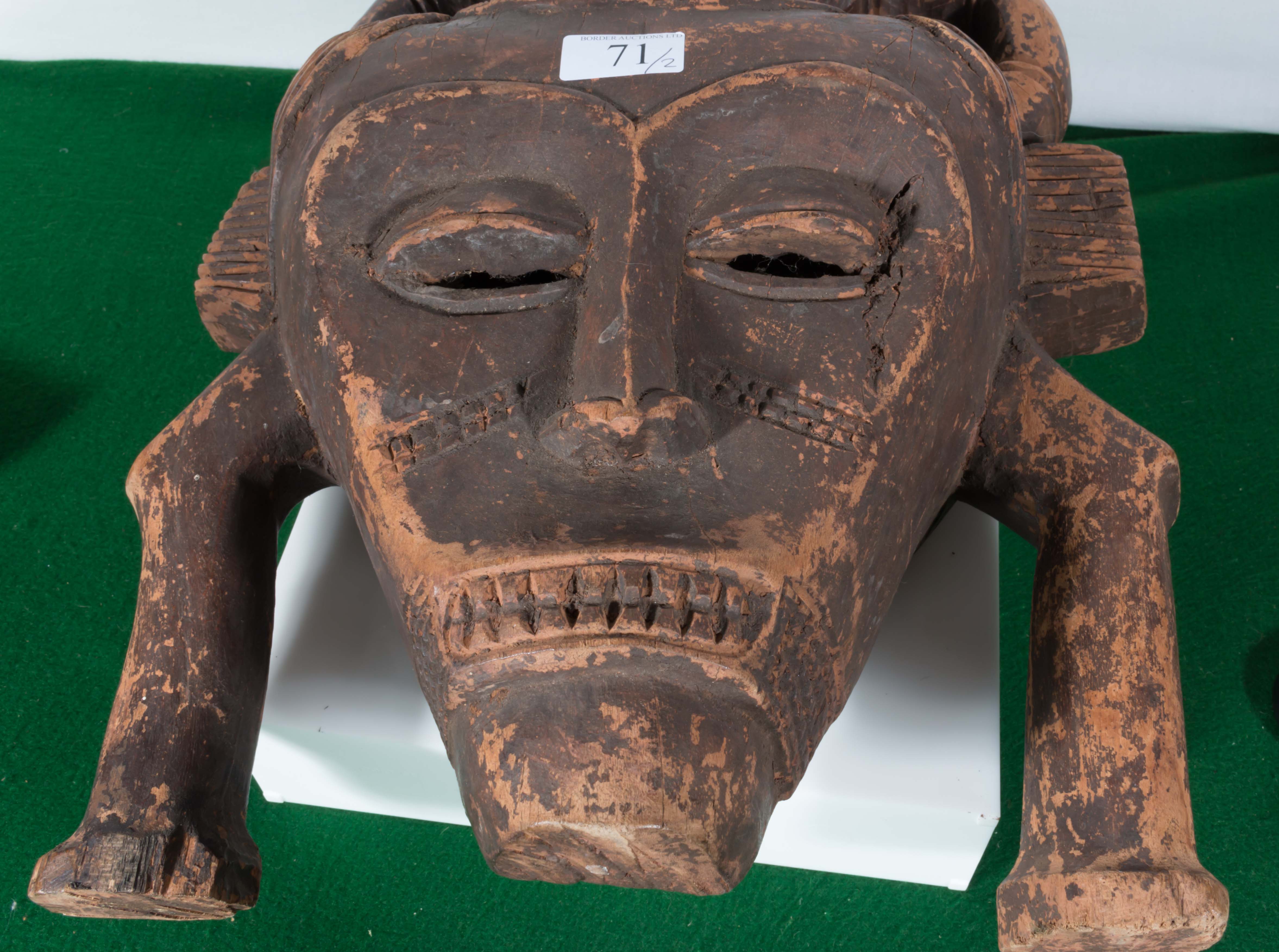 A carved African wooden mask together with a three necked bottle - Image 8 of 8