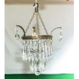 A small glass dropper chandelier