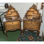 A pair of French gilded bed side cabinets with marble tops