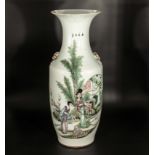 A large Chinese white ground vase with lady's in a garden decoration, 58cm tall