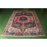 A pink ground woollen rug, 1.6m x 2 m