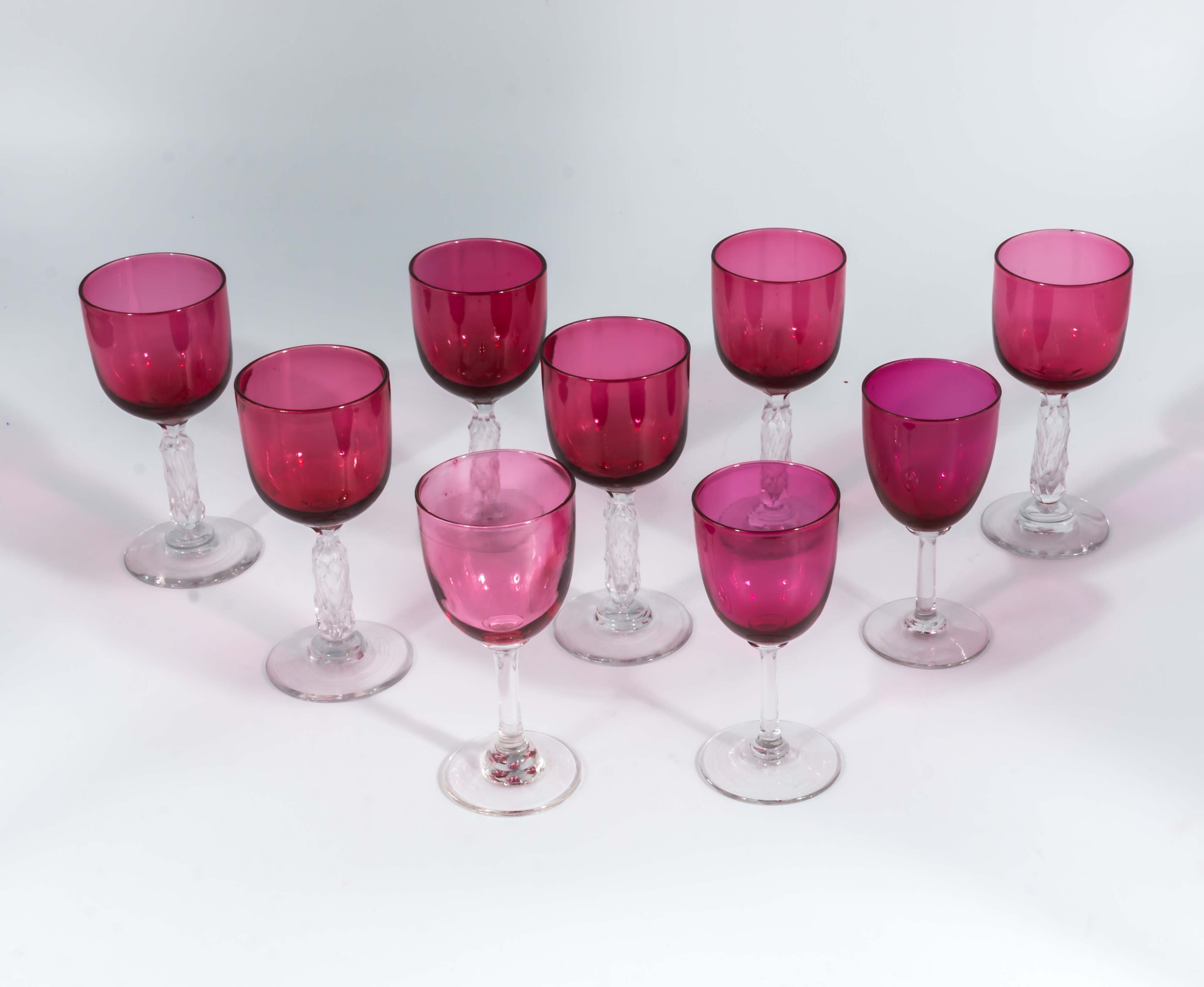 Nine cranberry wine glasses