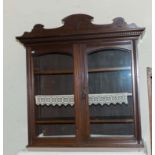 A late Victorian bookcase top