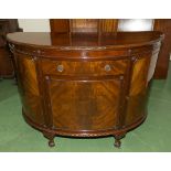 A reproduction Demi lune cabinet