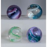 Four Caithness glass paper weights