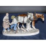 A Capodimonte figure group blacksmith shoeing horses