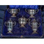 A five piece silver cruet set marks for Birmingham, makers mark AJB