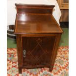 An Edwardian inlaid mahogany bed side cabinet