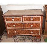 An antique scumble pine chest of two drawers over two