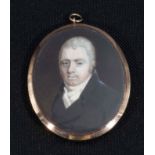 Georgian miniature of a gentleman in gold frame with mourning hair piece on reverse