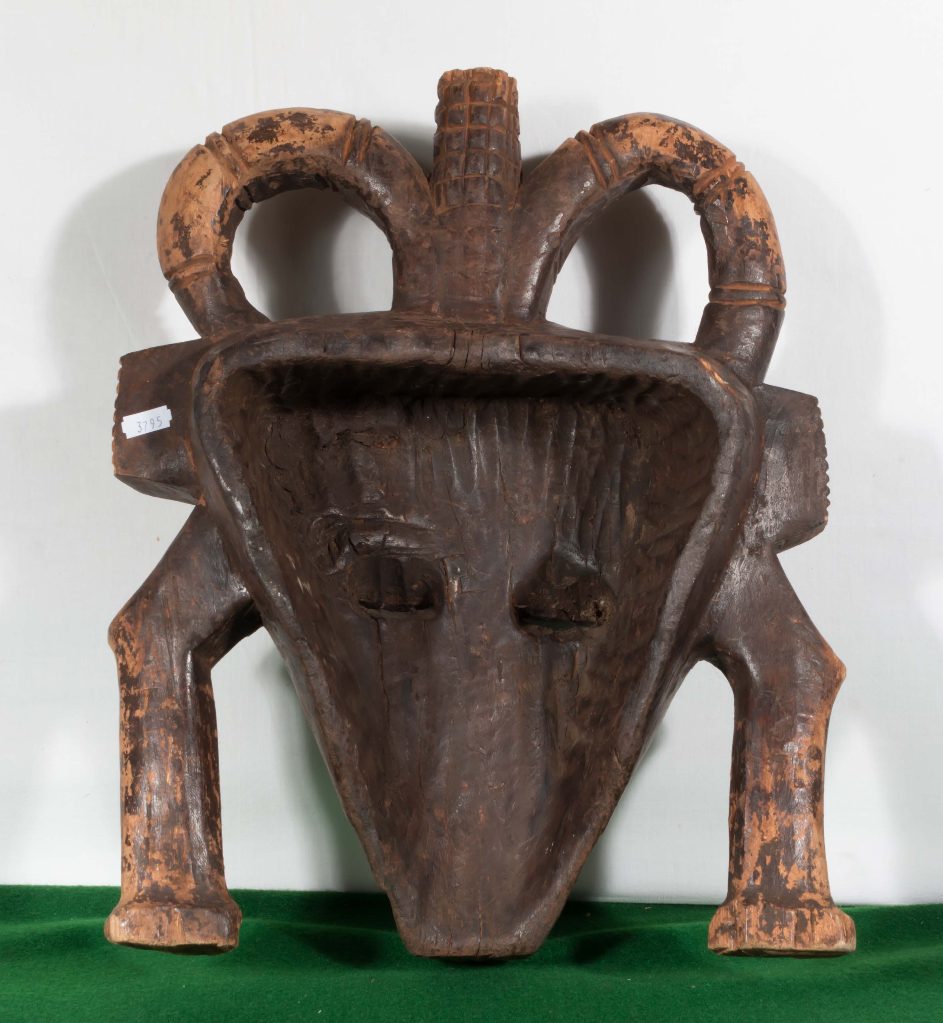 A carved African wooden mask together with a three necked bottle - Image 3 of 8