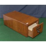 A vintage oak filing drawer