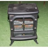 A log burner effect electric heater