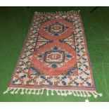 A Mercan wool rug 166cm x 97cm