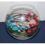 A large glass fish bowl