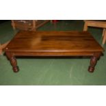 A hard wood coffee table